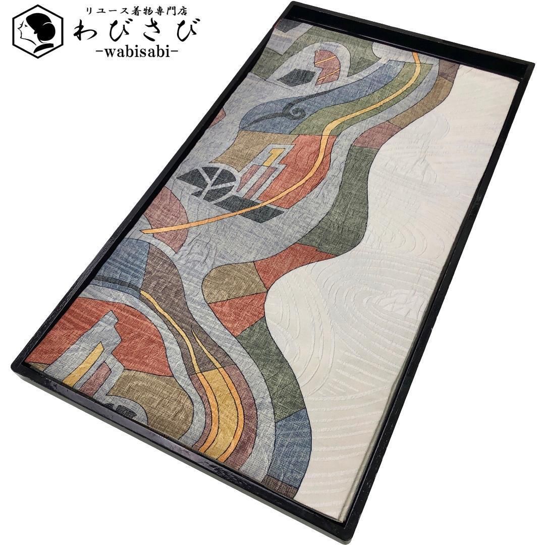 袋帯 鵬翔 博多織唯一の後染 抽象模様 胡粉色 O-5620