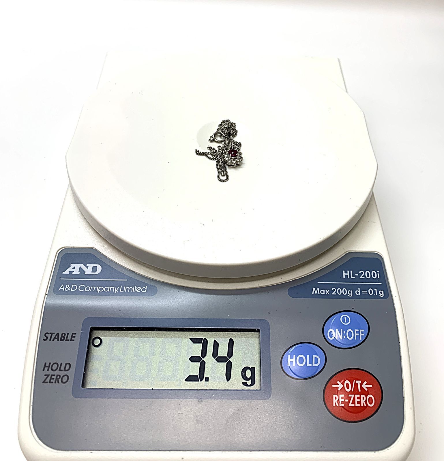 PT900 / PT850 コンビ 赤石 0.41ct ダイヤモンド 総計 0.24ct 