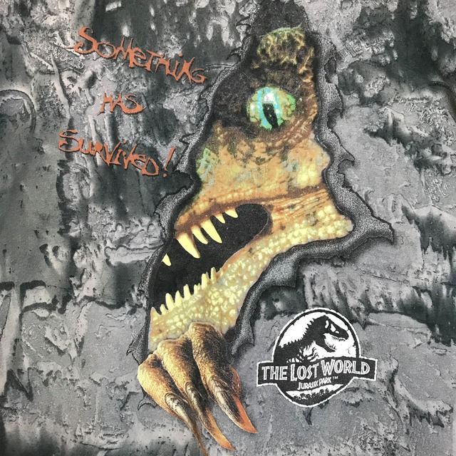 THE LOST WORLD JURASSIC PARK 総柄 T-sh 覗き恐竜 Tシャツ