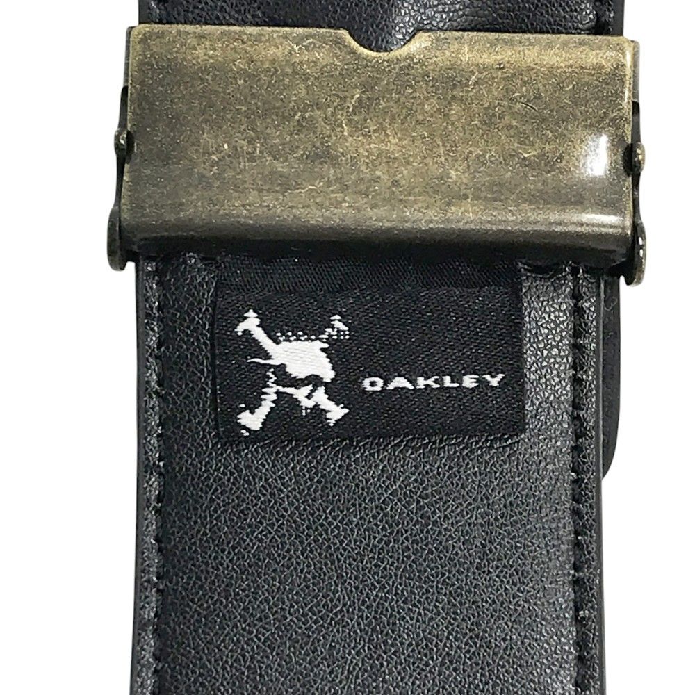 OAKLEY オークリー  スカル バックルベルト  ブラック系  [240101462752] ゴルフウェア ストスト OAKLEY オークリー スカル バックルベルト ブラック系 [240101462752