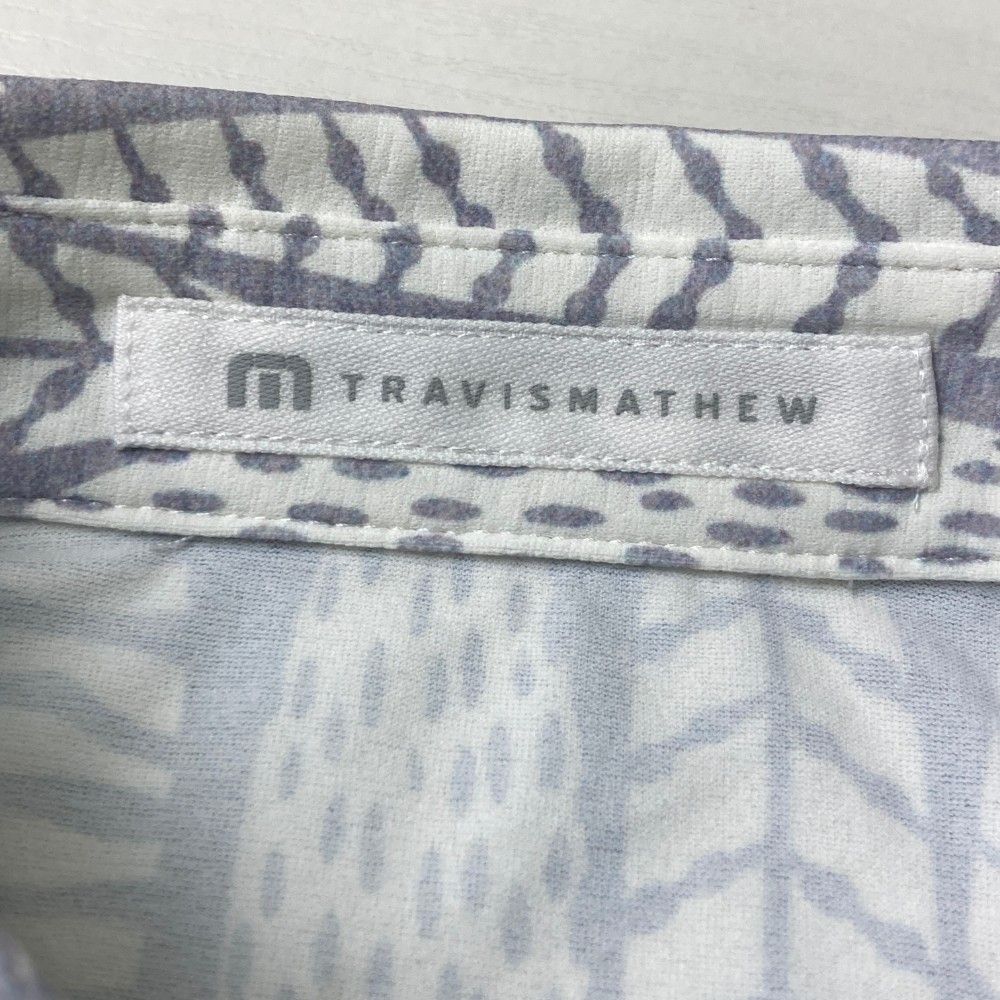 サイズ：S TRAVIS MATHEW トラビスマシュー  半袖ポロシャツ 総柄 グレー系 [240101424057] ゴルフウェア レディース ストスト サイズ：S TRAVIS MATHEW トラビスマシュー 半袖ポロシャツ 総柄