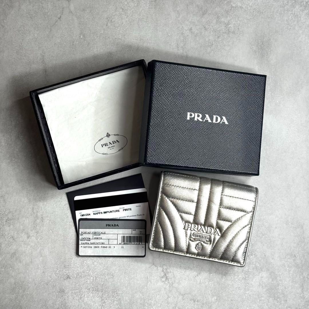 【極美品】プラダ 二つ折り ダイアグラム キルティング ブルー 1MV204 付属品完備】 PRADA プラダ / ダイアグラムキルティング