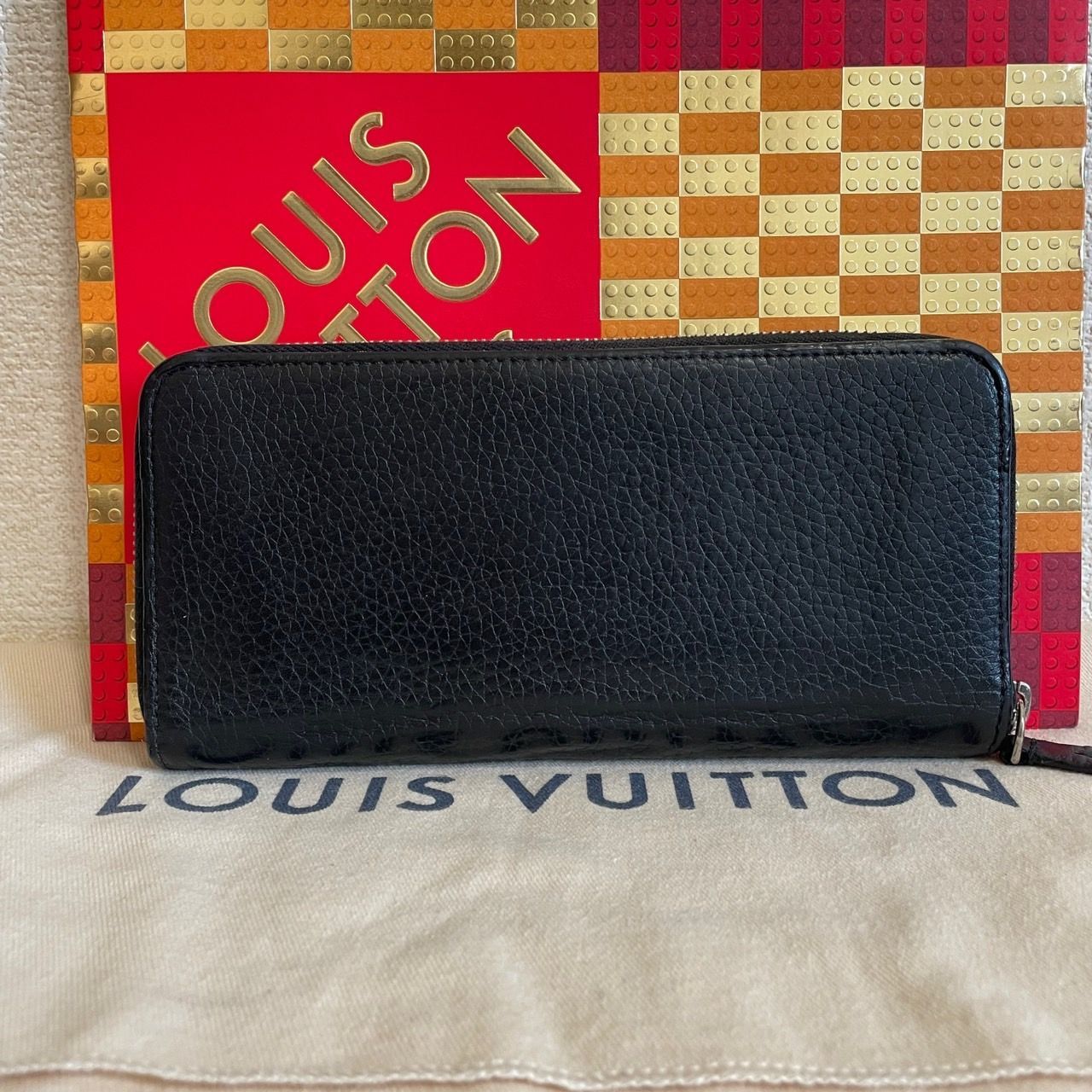 ルイヴィトン LV サークル ヴェルティカル トリヨンレザー 長財布