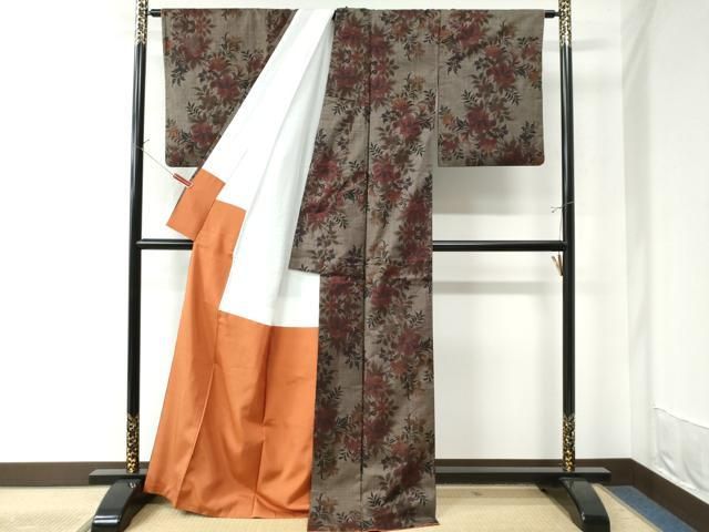 平和屋着物○本場大島紬 純泥染め 手織り 一元7マルキ 篭目色紙散らし