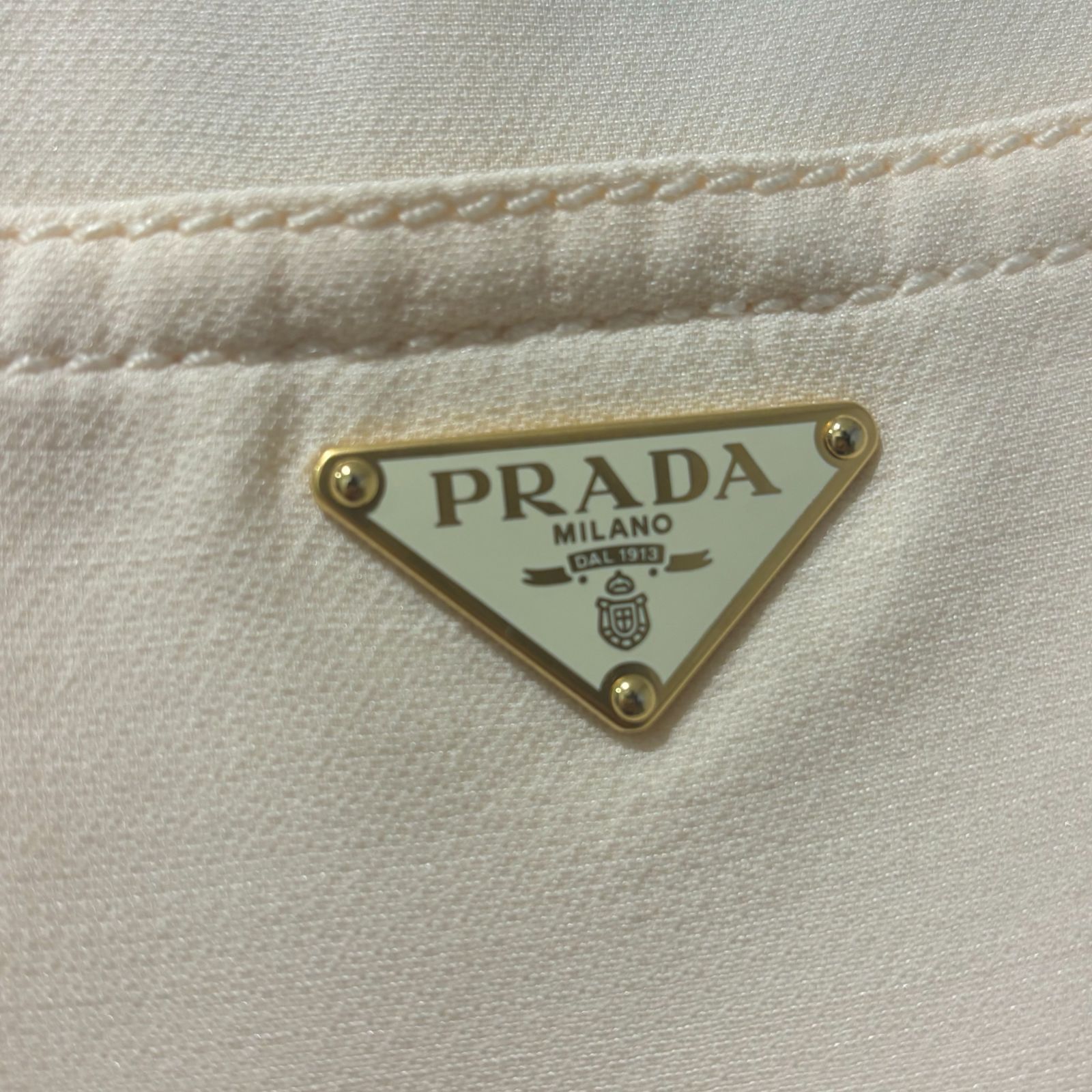 PRADA プラダ 23AW スラックスパンツ 三角プレート レディース size38S【表参道t】