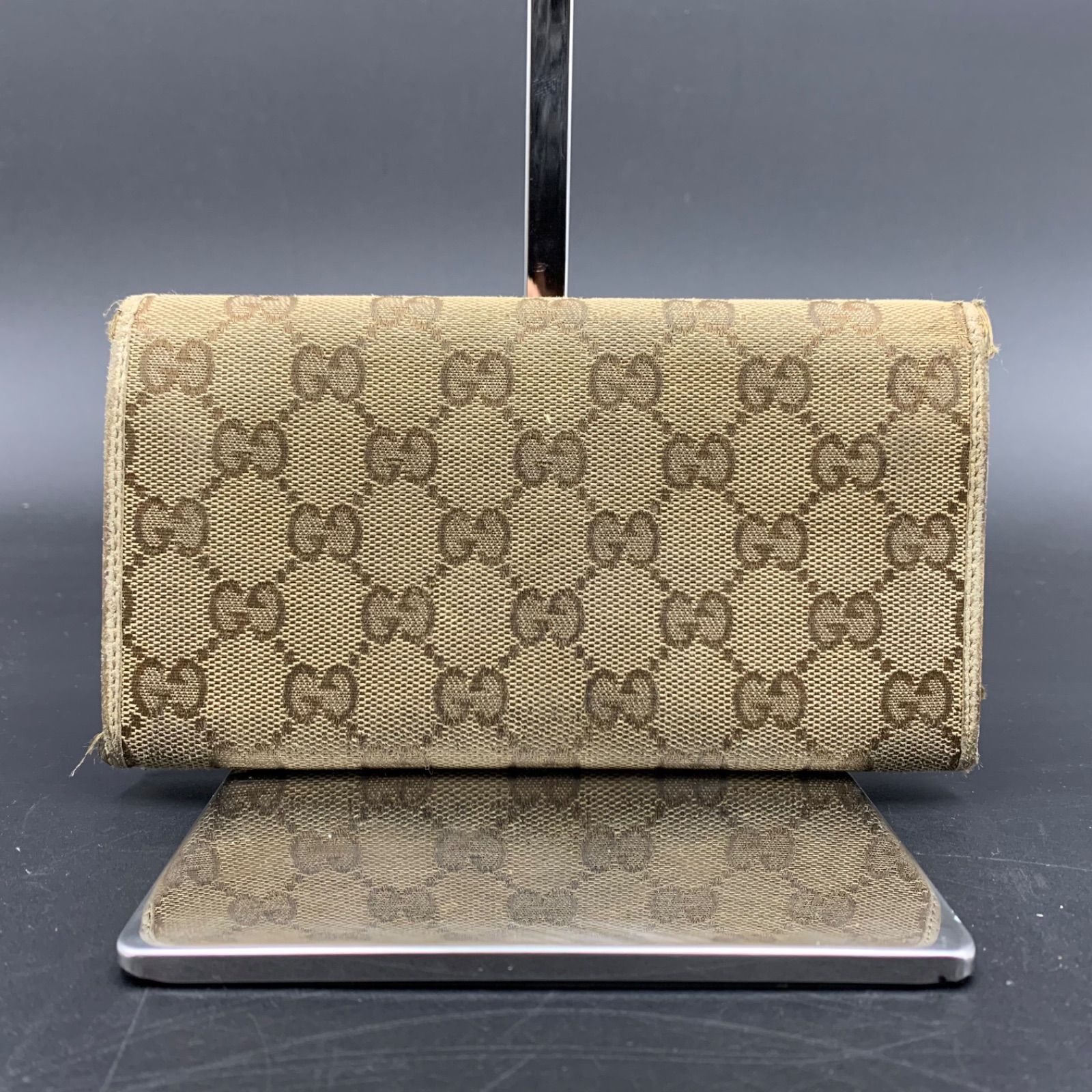 GUCCI GGキャンバス 二つ折り財布　長財布 . 57 GUCCI グッチ GGキャンバス 二つ折り長財布 - メルカリ