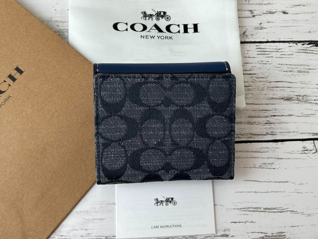 【新品未使用】COACH  コーチ二つ折り財布 馬モチーフブルーシグネチャー