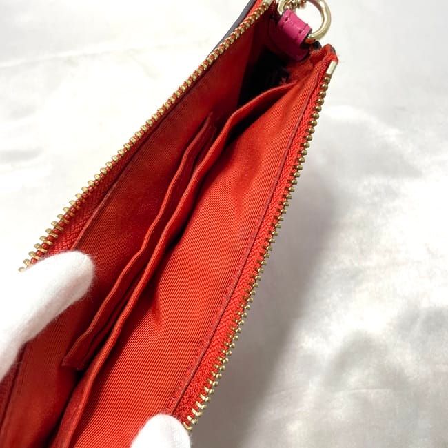 Coach Pink PVC Leather Accessory Pouch with Studs and Floral