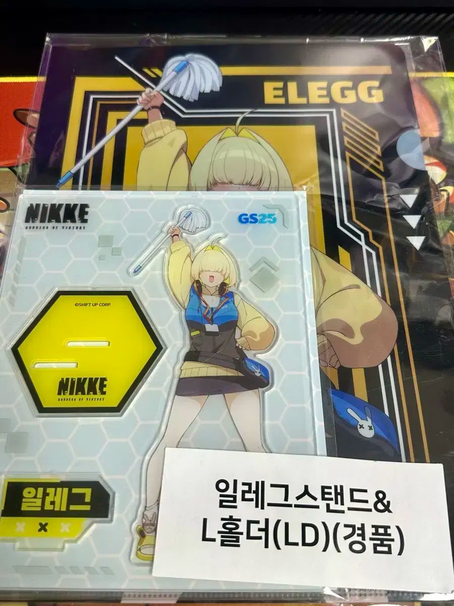 勝利の女神：NIKKE(ニケ) エレグ アクリルスタンド& L ホルダー ケース