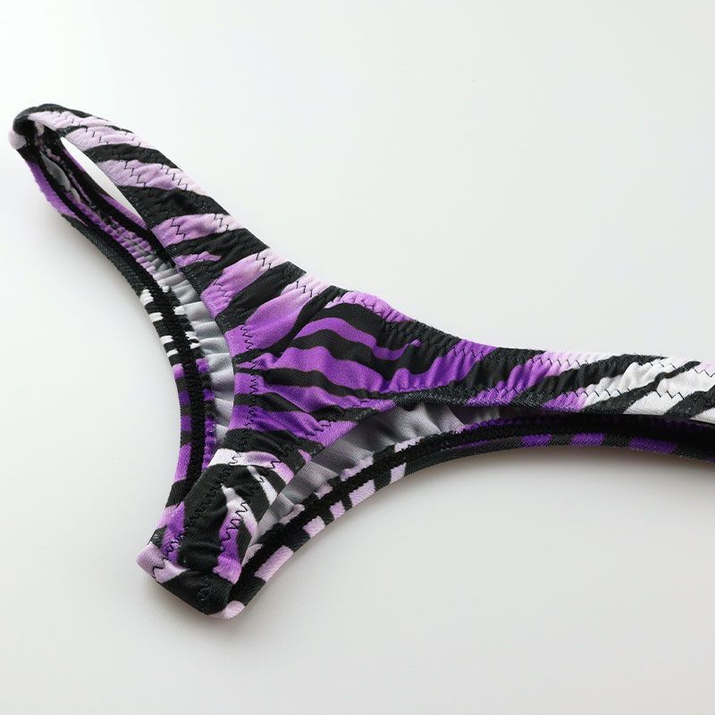 生地表面に上品な光沢感 伸びがよくシルキーな肌触り ゼブラ柄アニマル