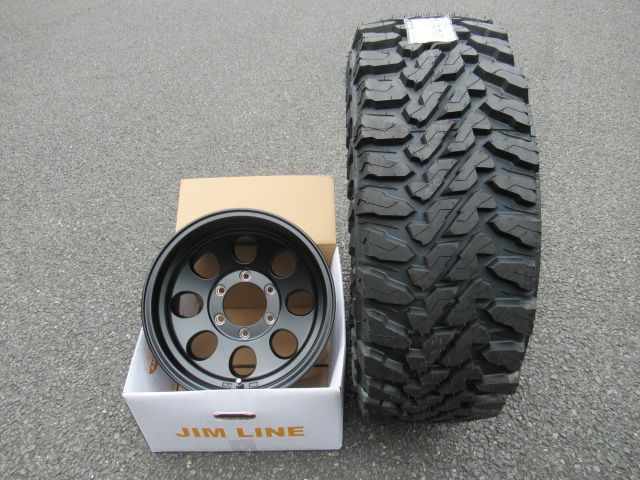 送料沖縄 離島を除き無料 個人宅 ランクル80系 プラド90系 ワイドボディー用 元祖丸穴 JIMLINE マットBK GEOLANDER G003 MT 315 75R16付き 4本セット