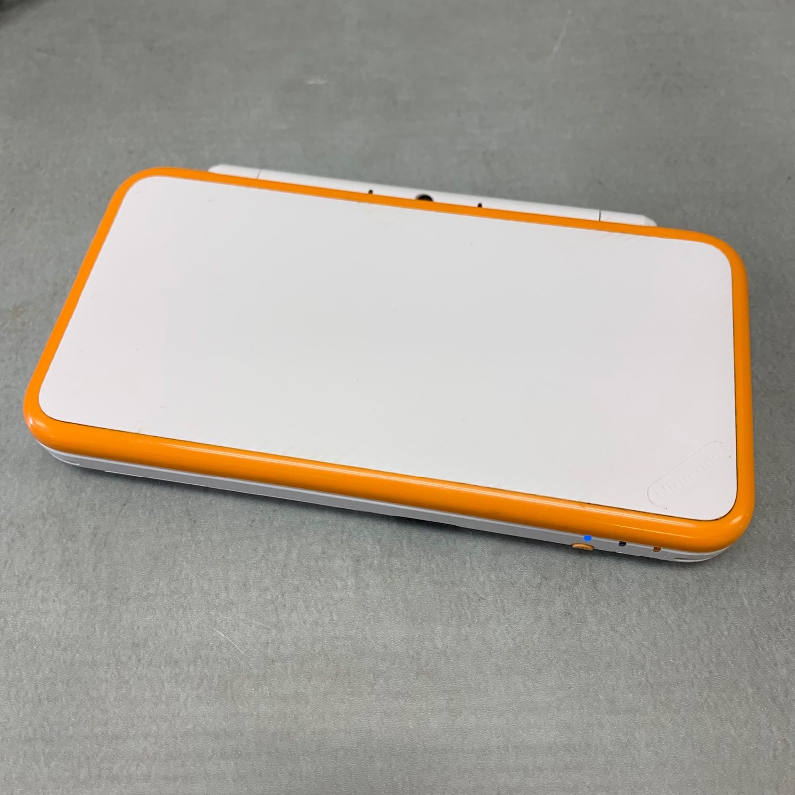ジャンク品〉Newニンテンドー2DSLL ホワイト×オレンジ Nintendo2DSLL