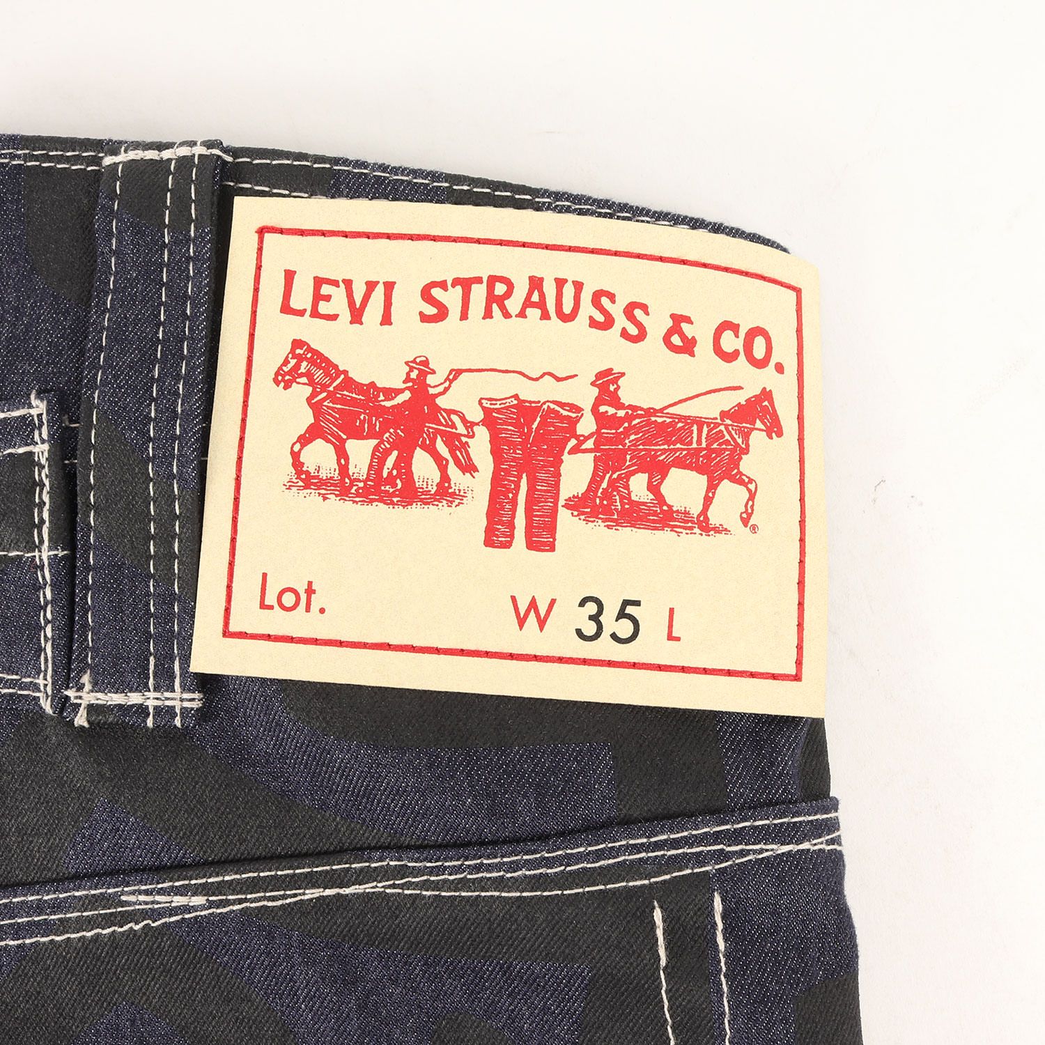 JUNYA WATANABE MAN COMME des GARCONS ジュンヤワタナベ マン コムデギャルソン 23SS Levis Keith Haring サスペンダー付き アート グラフィック デニム ワイド ペインター パンツ ジーンズ キース・へリング コラボ インディゴ ブラック XS 【メンズ】 JUNYA WATANABE MAN COMME des GARCONS ジュンヤワタナベ マン