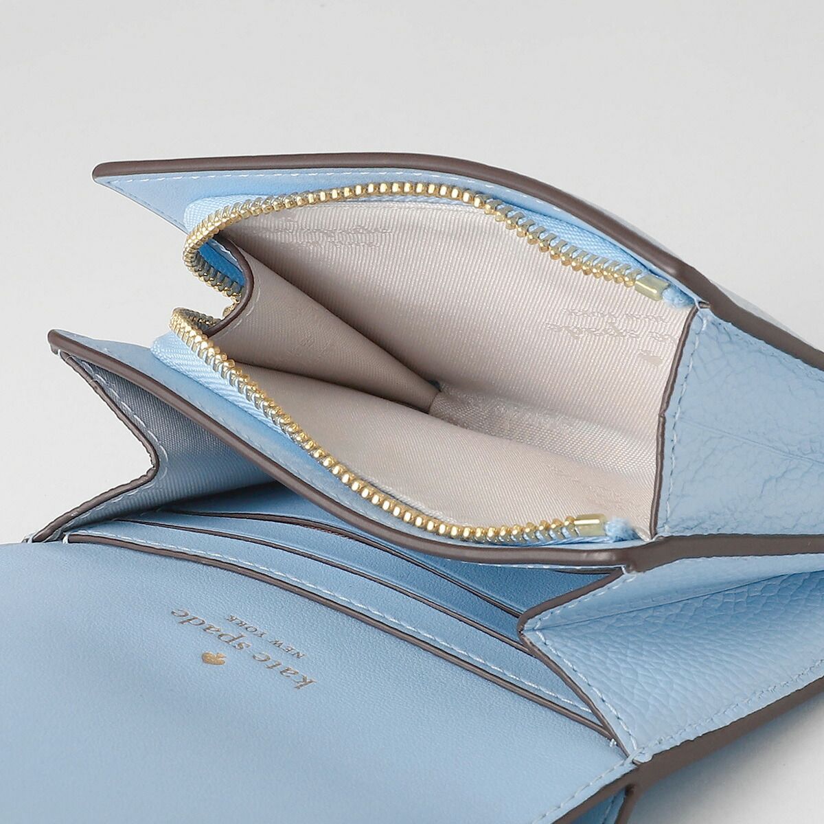kate spade 二つ折り財布 MONTAUK BLUE(モントークブルー) kate spade 二つ折り財布 MONTAUK BLUE(モントークブルー
