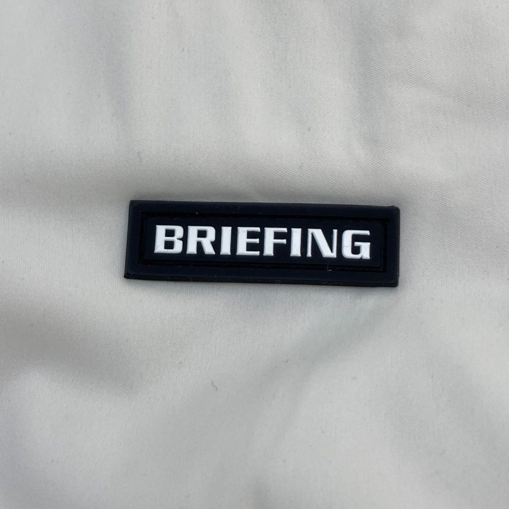 サイズ：M BRIEFING GOLF ブリーフィング ブラックレーベル ウィンドブロックハイネックスウェット  ホワイト系 [240101466557] ゴルフウェア メンズ ストスト サイズ：M BRIEFING GOLF ブリーフィング ブラックレーベル