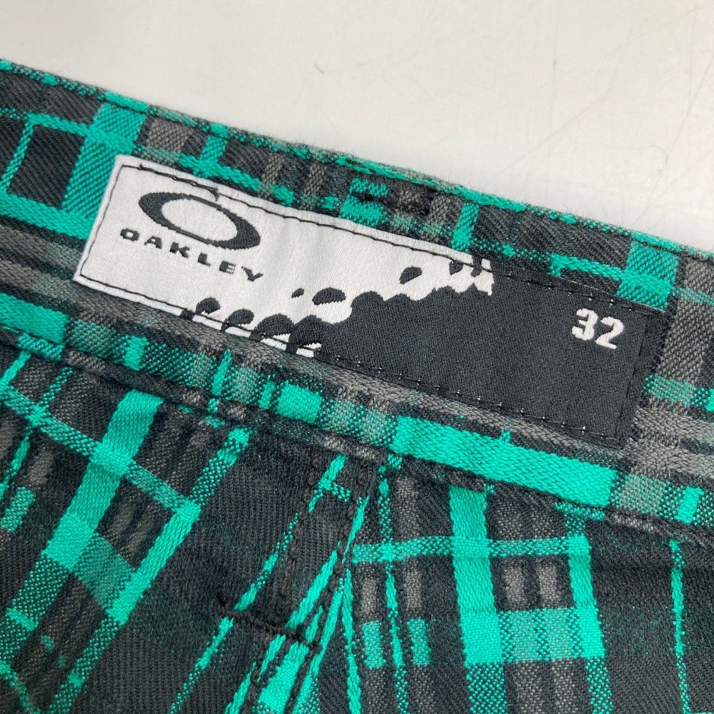 サイズ：32 OAKLEY オークリー  ロングパンツ チェック柄 グリーン系 [240101427420] ゴルフウェア メンズ ストスト サイズ：32 OAKLEY オークリー ロングパンツ チェック柄