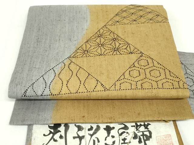 平和屋着物○九寸名古屋帯 作家物 紬地 刺子 幾何学七宝花文 証紙付き  