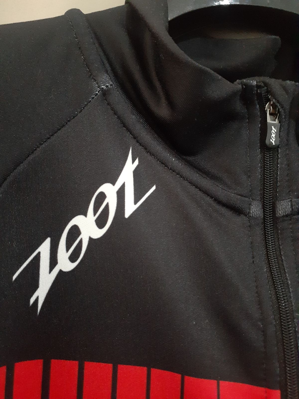 新品★ Zoot アイアンマン ランニング ハーフジップ ジャケット ZOOT ズート アイアンマン IRONMAN トライアスロン ウェア M