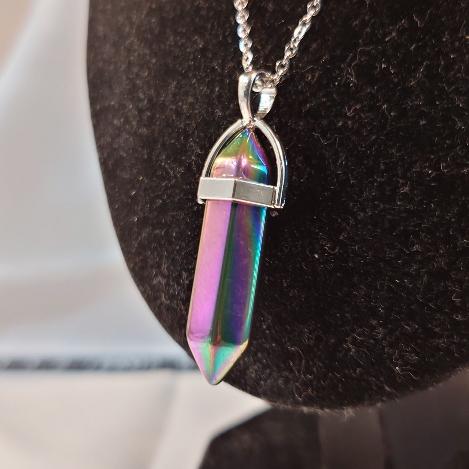 レインボーチタニウムオーラ 虹色に輝くレインボーチタンオーラクリスタルのダブルポイント