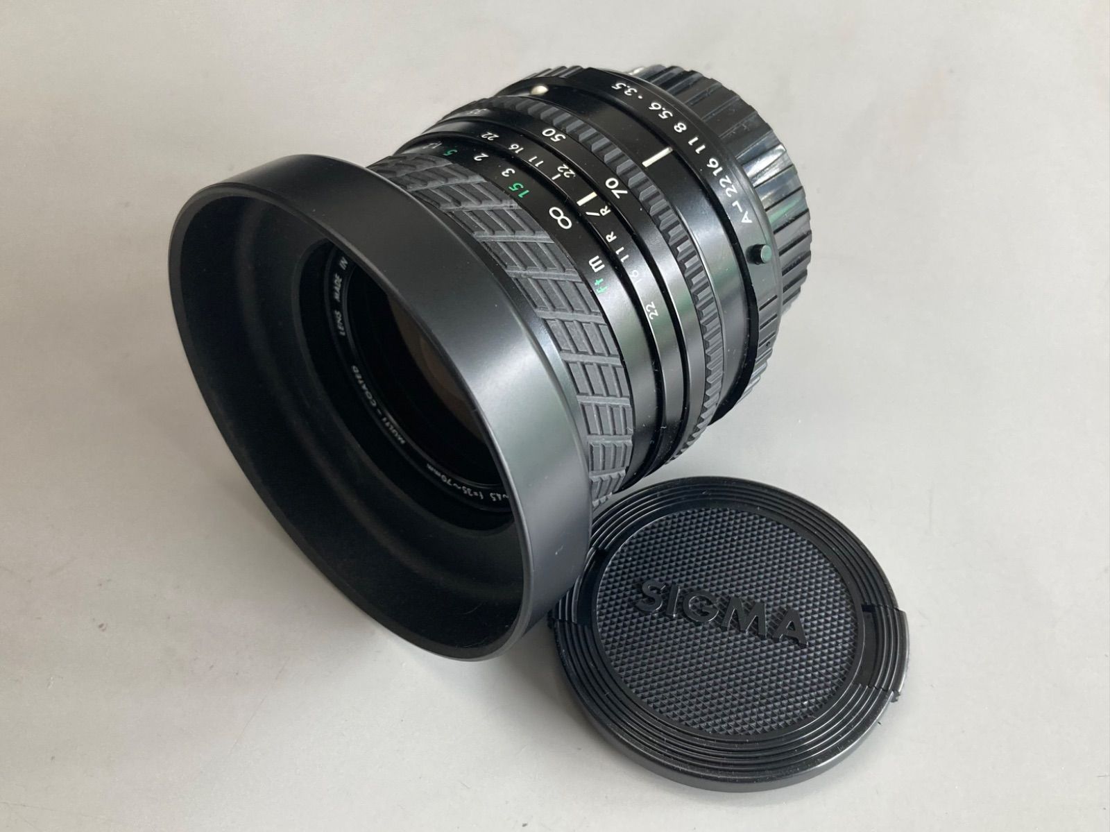 Sigma 35-70mm f3.5-4.5 Zoom Master Autofocus lens I Minolta/Sony A mount + Sigma caps