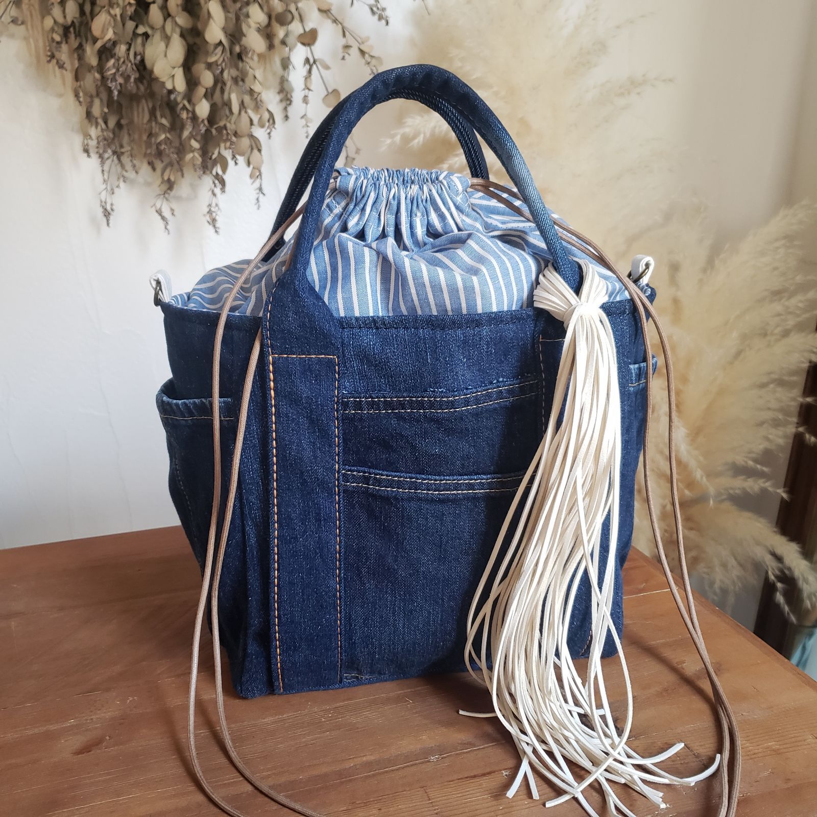 USEDデニムリメイク あおり巾着トートバッグ デニムリメイク巾着付きトートバッグ - メルカリ