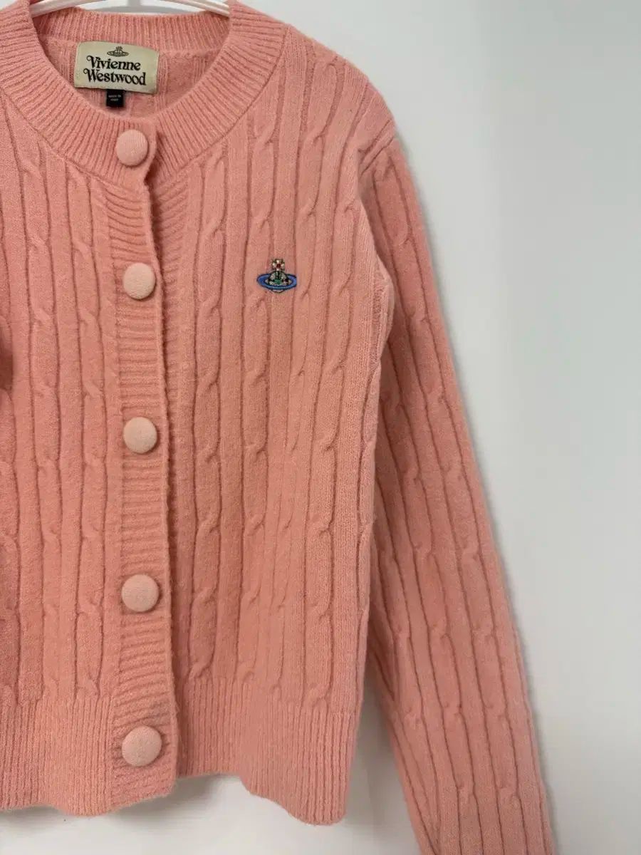 ピンク カーディガン