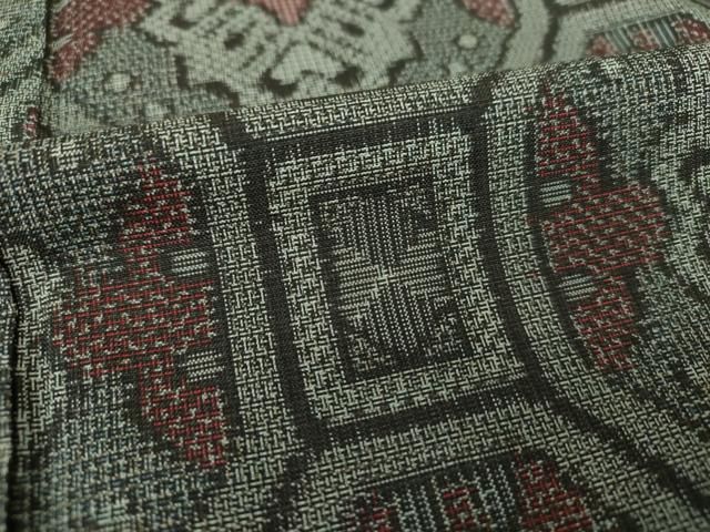 平和屋着物○本場大島紬 割り込み絣 蜀江花文 正絹 逸品 未使用  