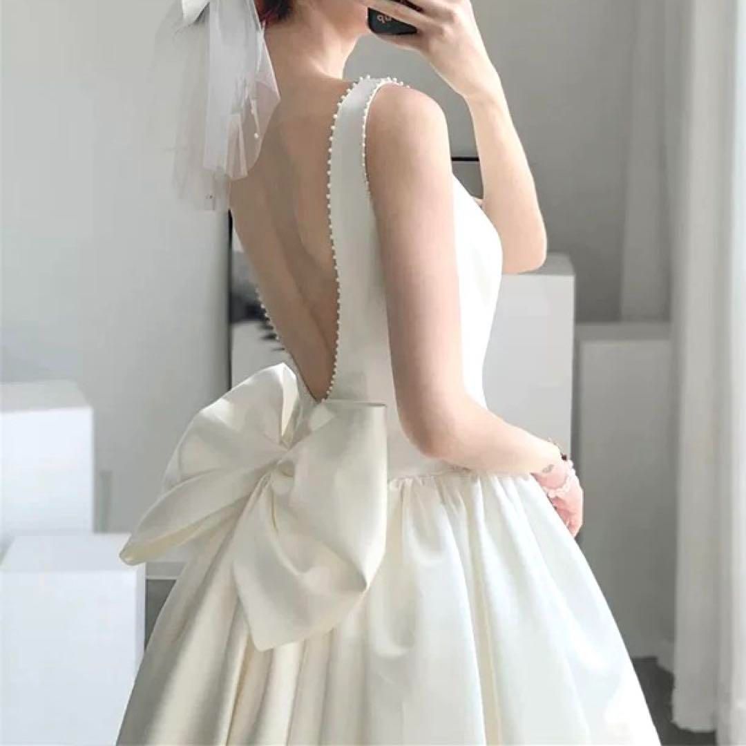 パールが可愛い リボン付き ミモレ丈 ワンピース ホワイト 新品・未使用】パールが可愛い リボン付き ミモレ丈 ワンピース