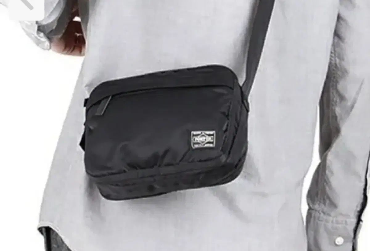 ナイキスリングバック 良品】Nike スリングバッグ オレンジ/黒 良品