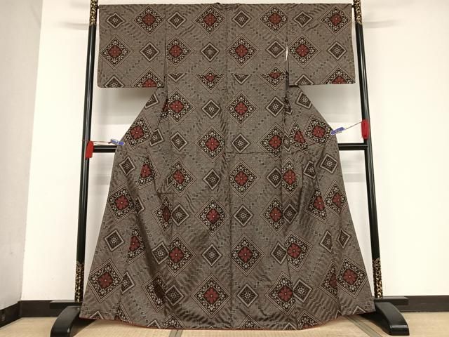 平和屋着物○本場大島紬 龍郷絣 反端付き 正絹 逸品 未使用 AAAU0369np  