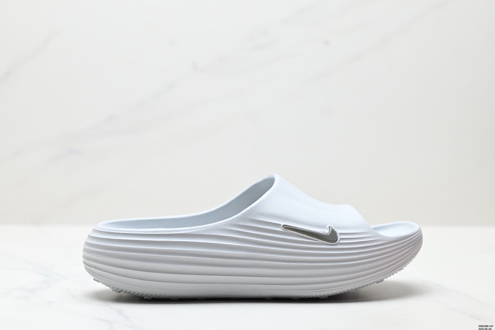 Nike ReactX REJUVEN8 Slide ナイキ シンプルで快適な 穴付きスリッパ 在庫 価格 -WTO輸入2