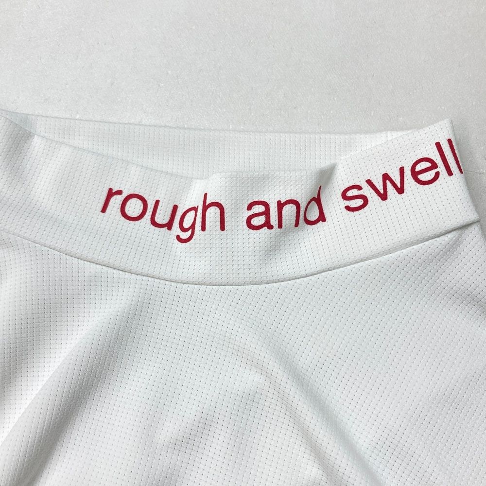 サイズ：S ROUGH&amp;SWELL ラフアンドスウェル 2023年モデル ハイネック 長袖Tシャツ ロゴプリント  ホワイト系 [240101365507] ゴルフウェア レディース ストスト サイズ：XL ROUGH&SWELL ラフアンドスウェル ハイネック 長袖T