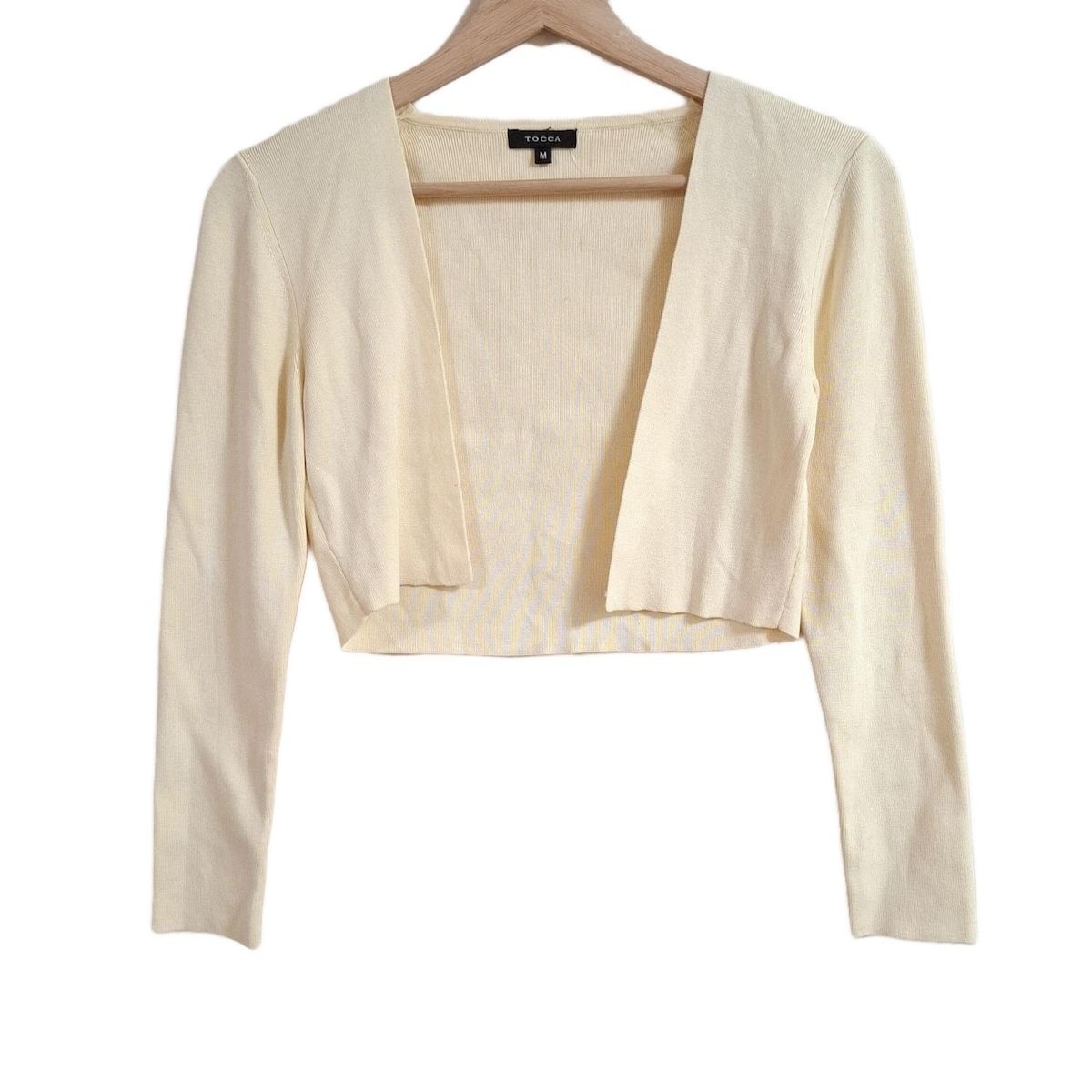 【未使用】TOCCA ボレロ　Mサイズ TOCCA(トッカ) ボレロ サイズM レディース - アイボリー 長袖
