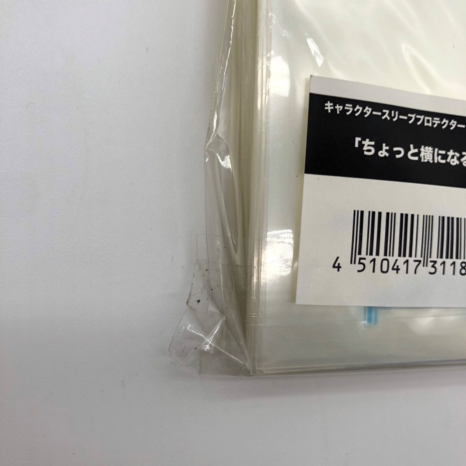 訳あり】新品/外袋汚れ | キャラクタースリーブプロテクター 【世界の