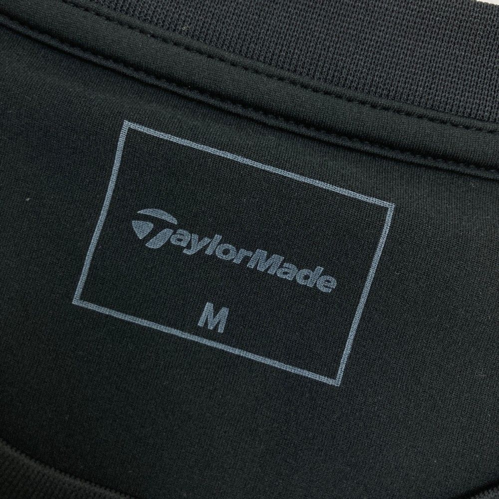 サイズ：M TAYLOR MADE テーラーメイド 2024年 半袖Tシャツ  ブラック系 [240101447307] ゴルフウェア メンズ ストスト サイズ：M TAYLOR MADE テーラーメイド 2024年 半袖Tシャツ
