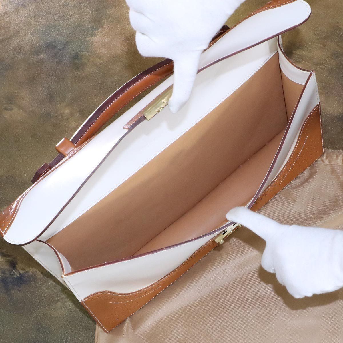 TUCCHINO ツキーノ　レディースハンドバッグ Tucchino