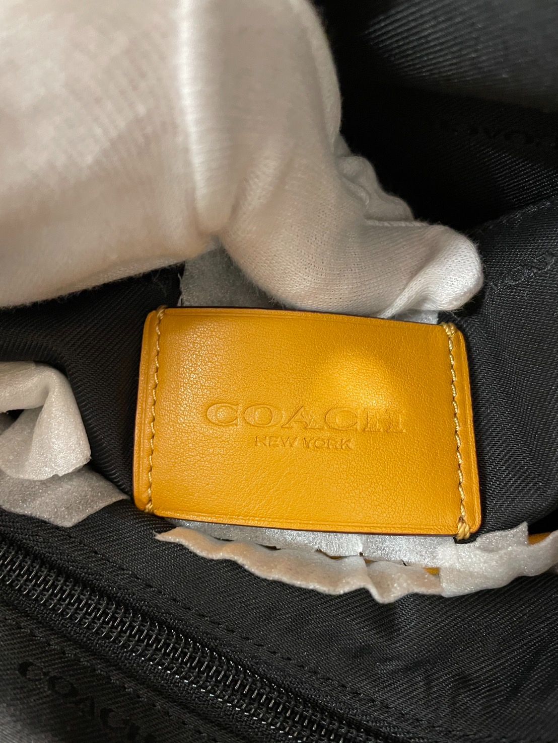 新品、未使用、タグ付き)COACH リュック イエロー レザー