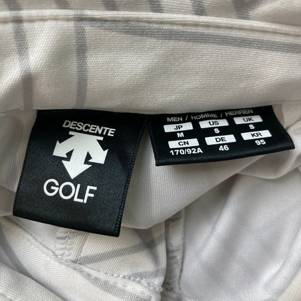サイズ：M DESCENTE GOLF デサントゴルフ  半袖ポロシャツ 総柄 ホワイト系 [240101443677] ゴルフウェア メンズ ストスト DESCENTE GOLF - デサントゴルフ 【メンズ ゴルフウェア