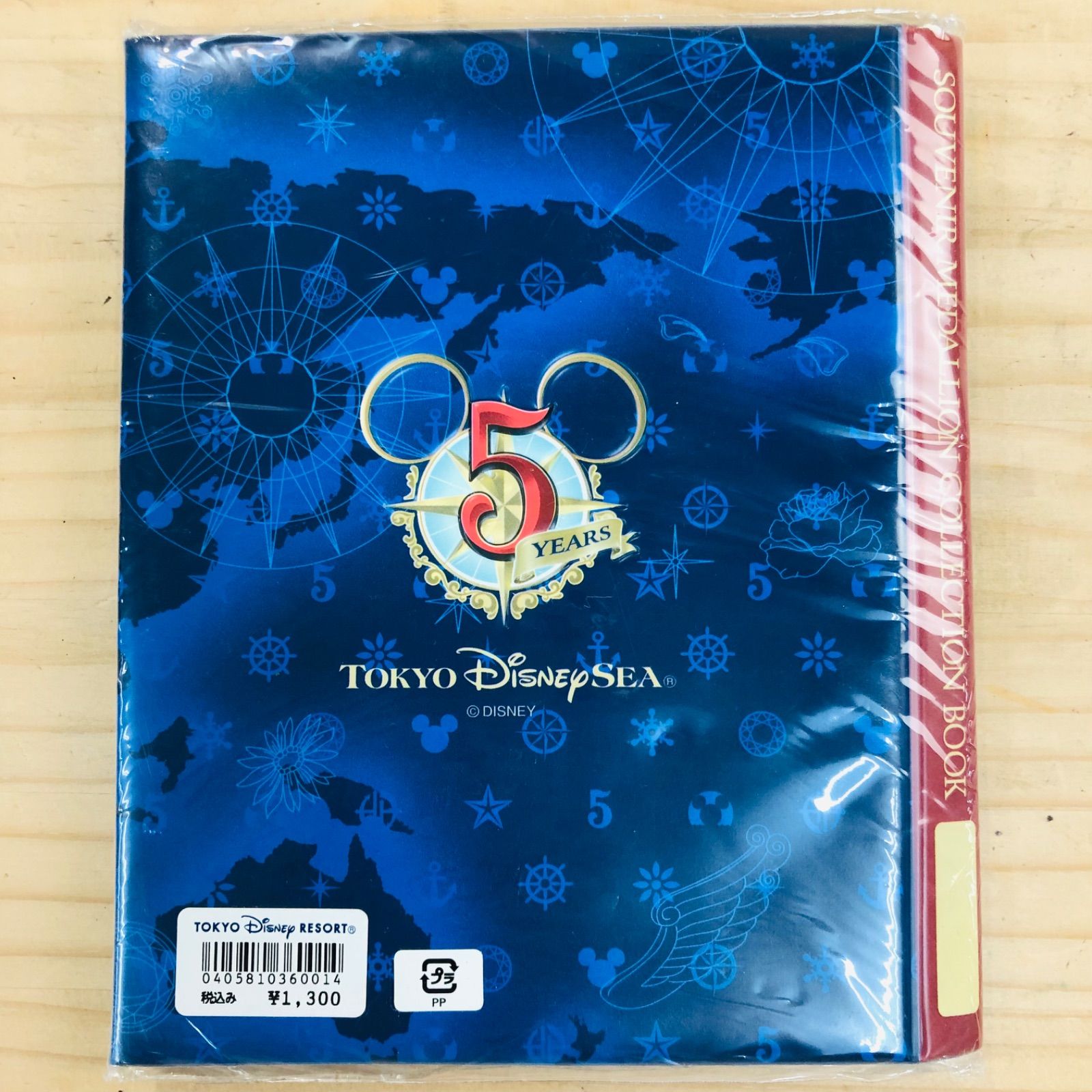 ディズニー　スーベニアメダル　592枚　コレクションブック12冊付き ディズニー40周年デザインのスーベニアメダルコレクションブック