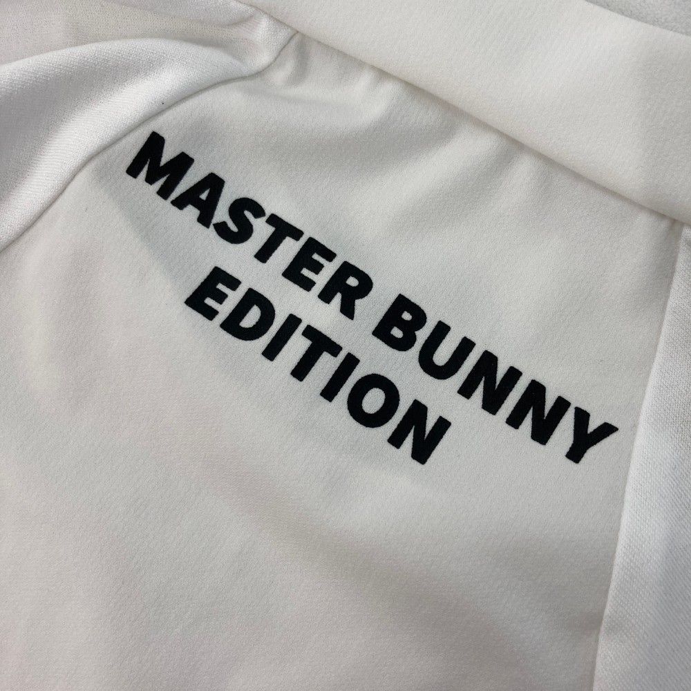 サイズ：4 MASTER BUNNY EDITION マスターバニーエディション  ハイネック 長袖Tシャツ X+I  ホワイト系 [240101446950] ゴルフウェア メンズ ストスト サイズ：4 MASTER BUNNY EDITION マスターバニーエディション