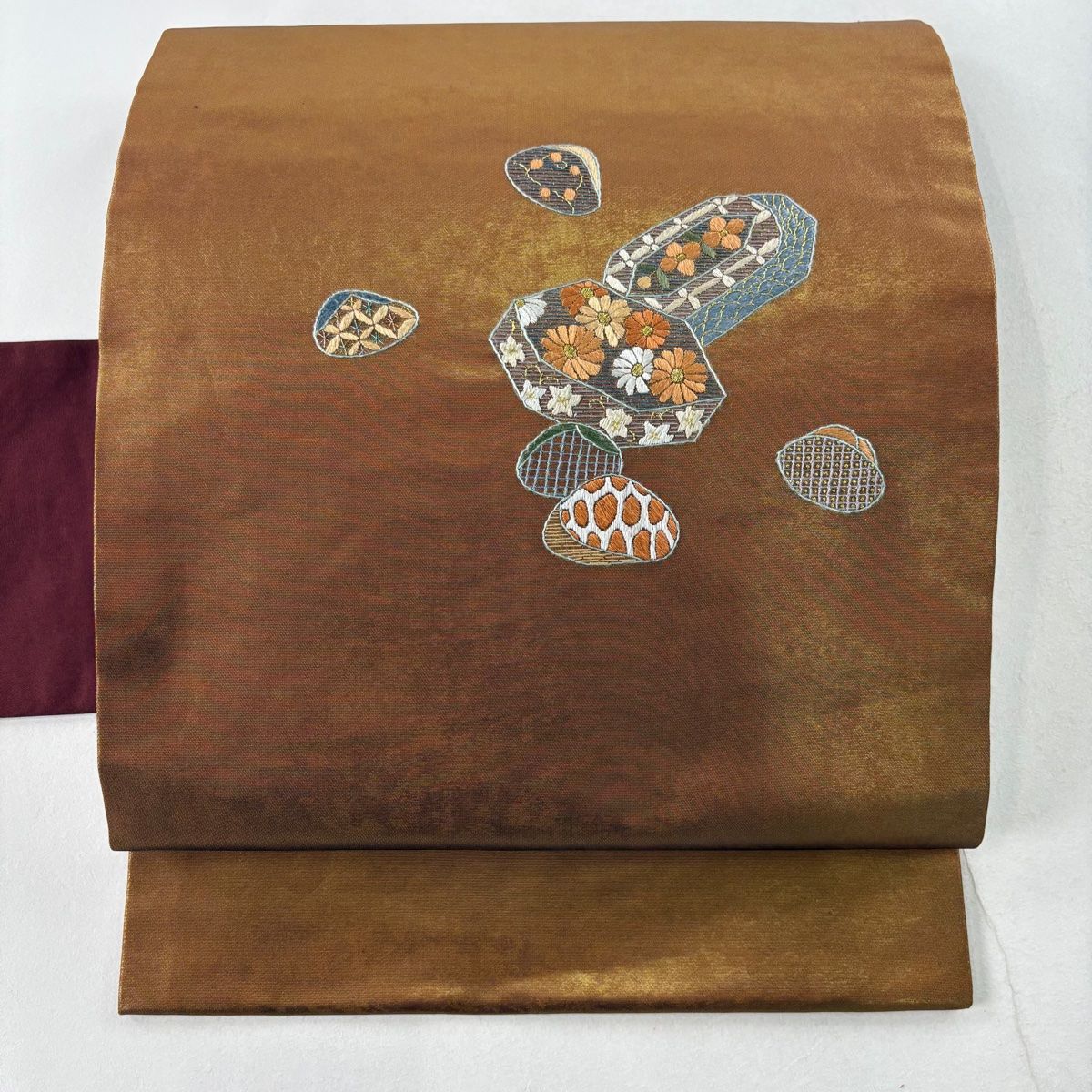 正絹 繼れ織り 名古屋帯(淡い茶系ゴールド 刺繍) ￥200,000の品