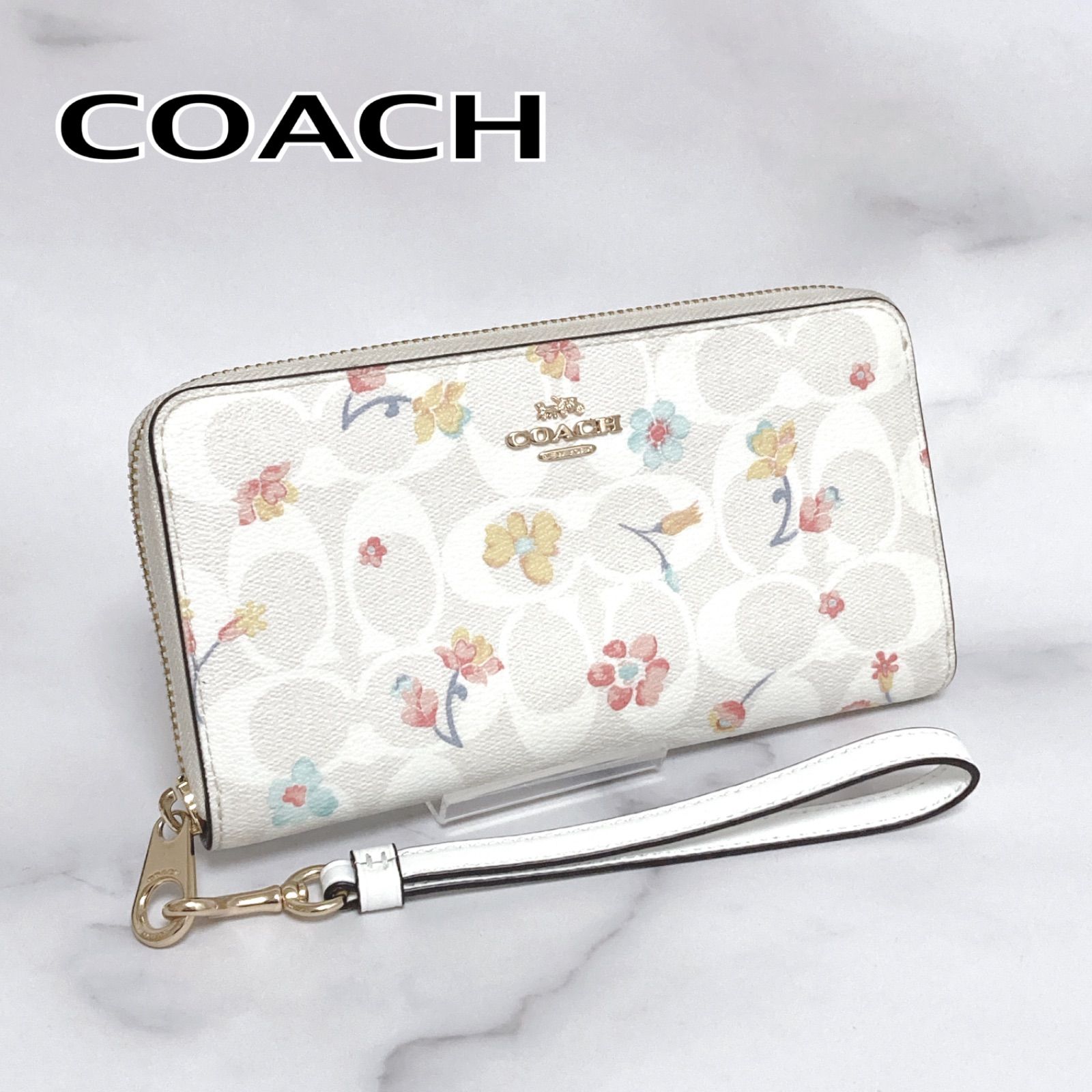 ほぼ新品】「COACHコーチ」ラグジュアリー シグネチャー(総柄) トート 