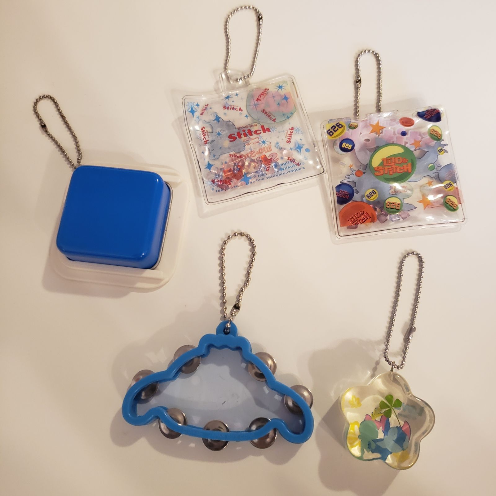 ディズニー スティッチ スクランプ 物入れ キーホルダー ディズニー スクランプ キーホルダー スティッチ - メルカリ