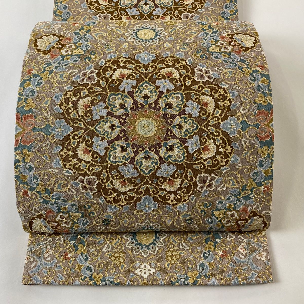 袋帯 美品 逸品 明綴れ 華文 花唐草 金糸 茶紫 全通 正絹 【中古 