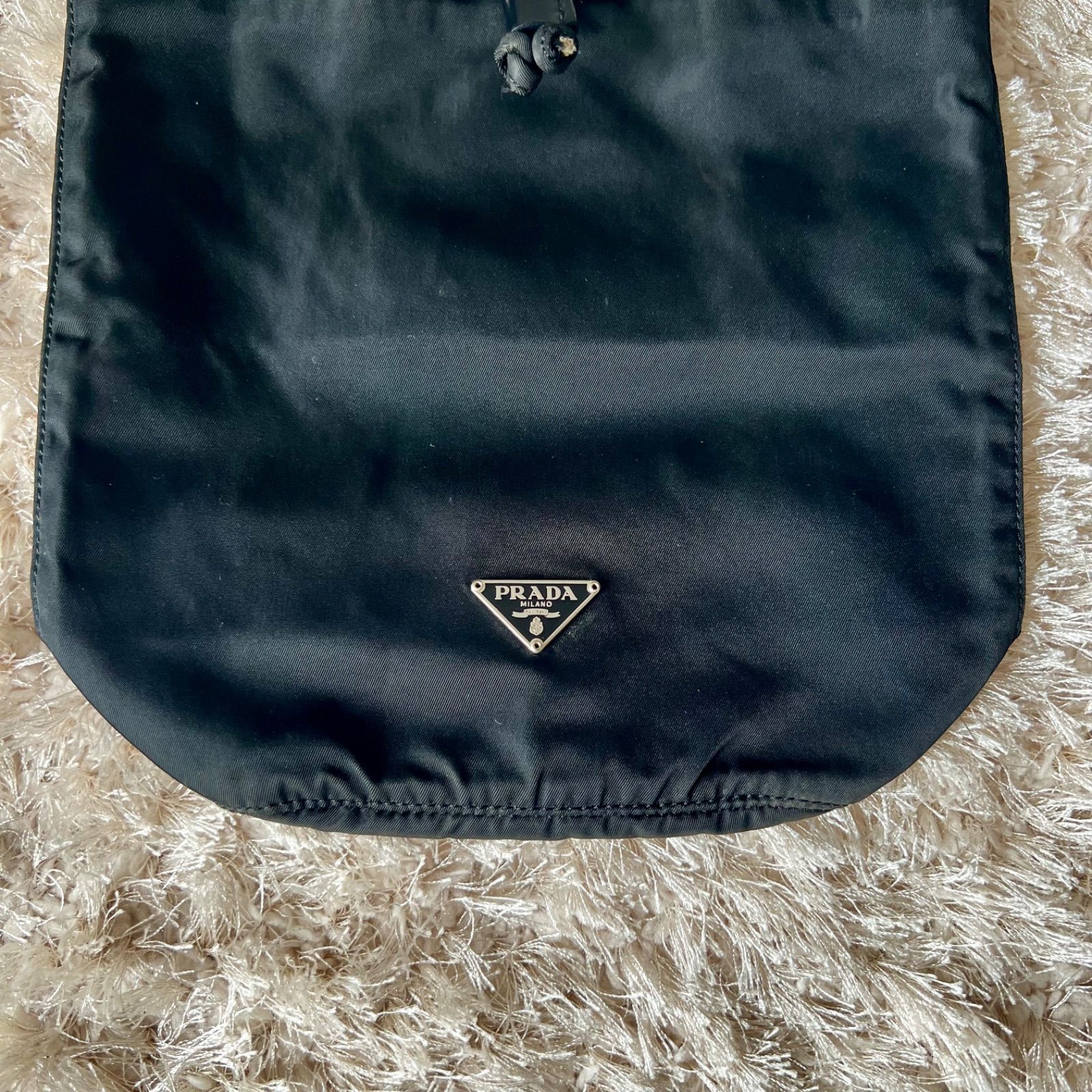 PRADA プラダ 巾着 ポーチ テステート 三角ロゴ 黒 - メルカリ