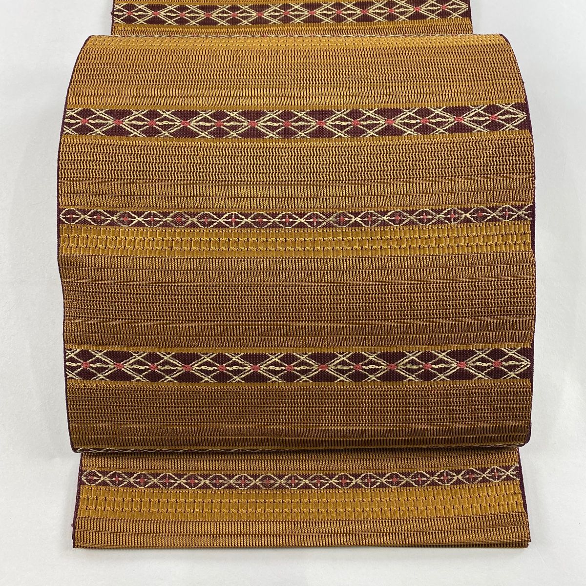 美品】 名古屋帯 秀品 八寸名古屋帯 段縞 幾何学模様 山吹茶色 正絹