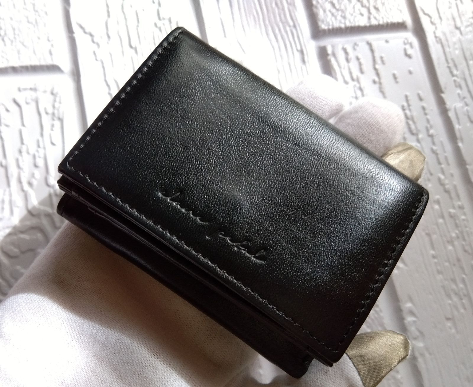 CLANE／三つ折り財布