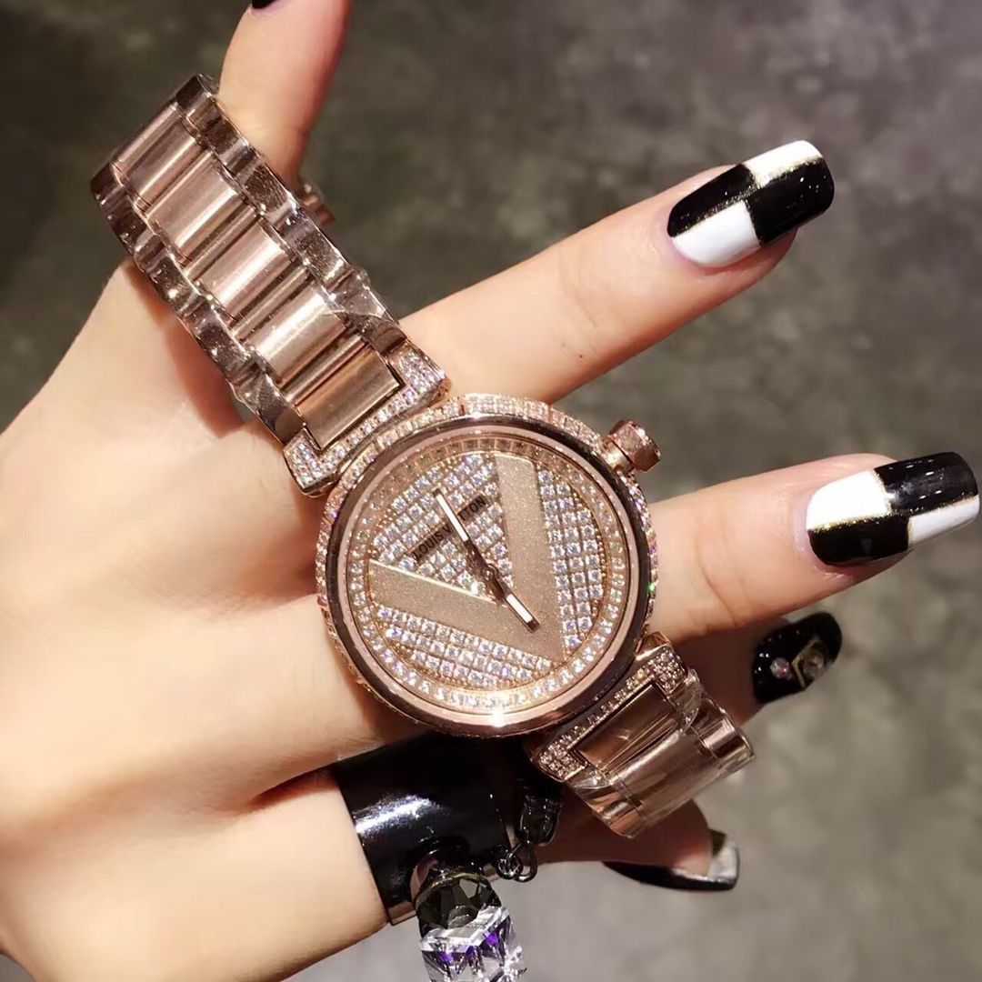 LOUIS VUITTON ルイヴィトン レディース腕時ケ 33mm｜スター