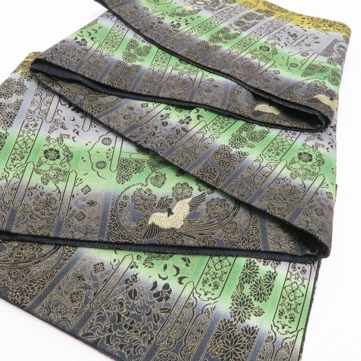 前田仁仙 更紗 袋帯 未使用品 全通柄 正絹 新品 前田仁仙 落款 更紗 金