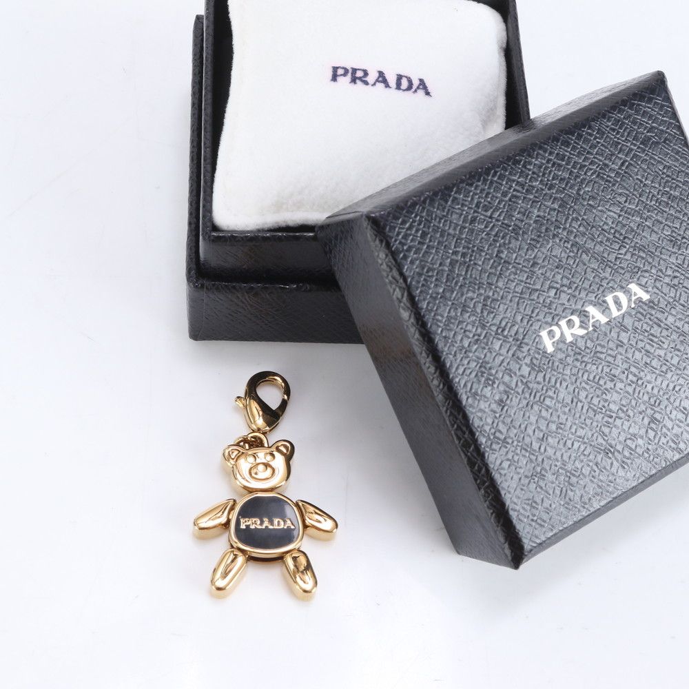 PRADA プラダ クマ型キーホルダー ゴールド/ブラック チャーム ⓪ PRADA - PRADA プラダ ロゴ 熊 クマ ベア キーホルダー チャーム
